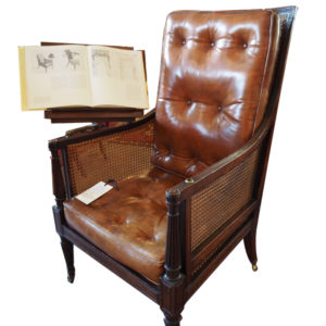 Regency period caned mahogany library armchair with original adjustable reading slope c1815